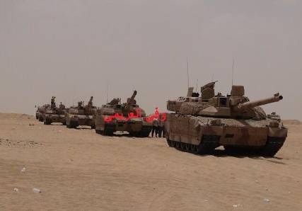 قوات عسكرية ضخمة تحتشد إلى محيط العند لاقتحامها وطيران التحالف يكثف غاراته على القاعدة